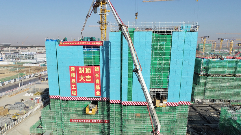 看建雄安丨雄東片區(qū)A單元安置房項(xiàng)目88棟住宅樓主體結(jié)構(gòu)全部封頂